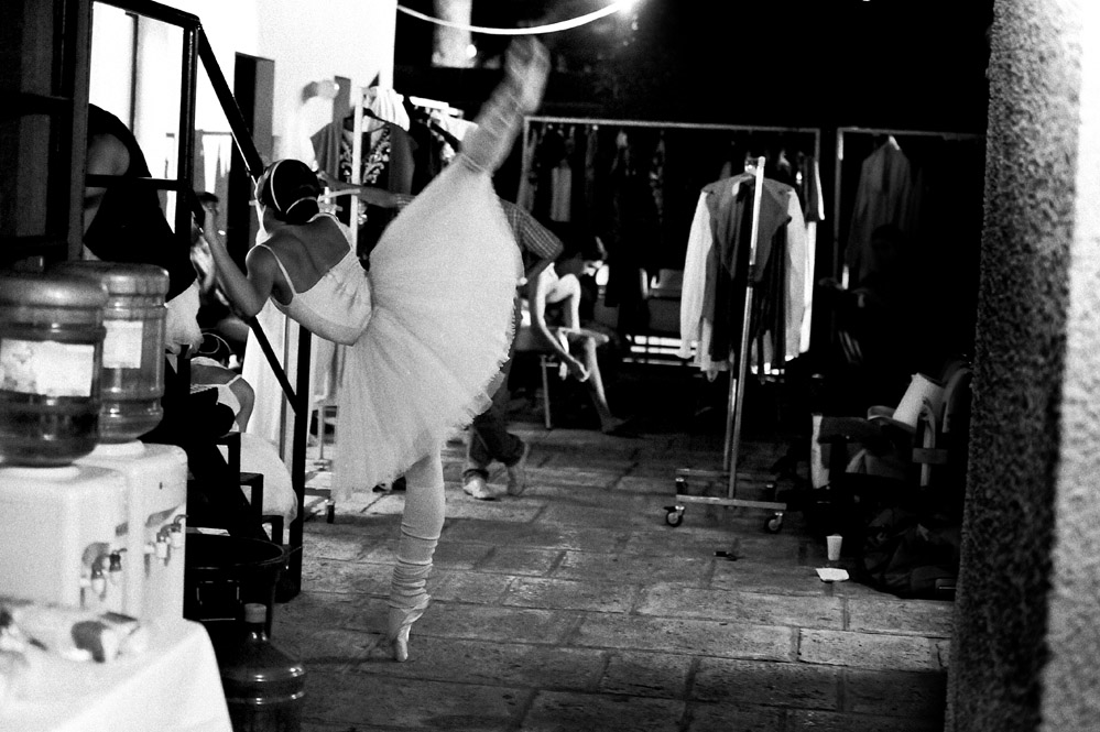 dancer warming up backstage
